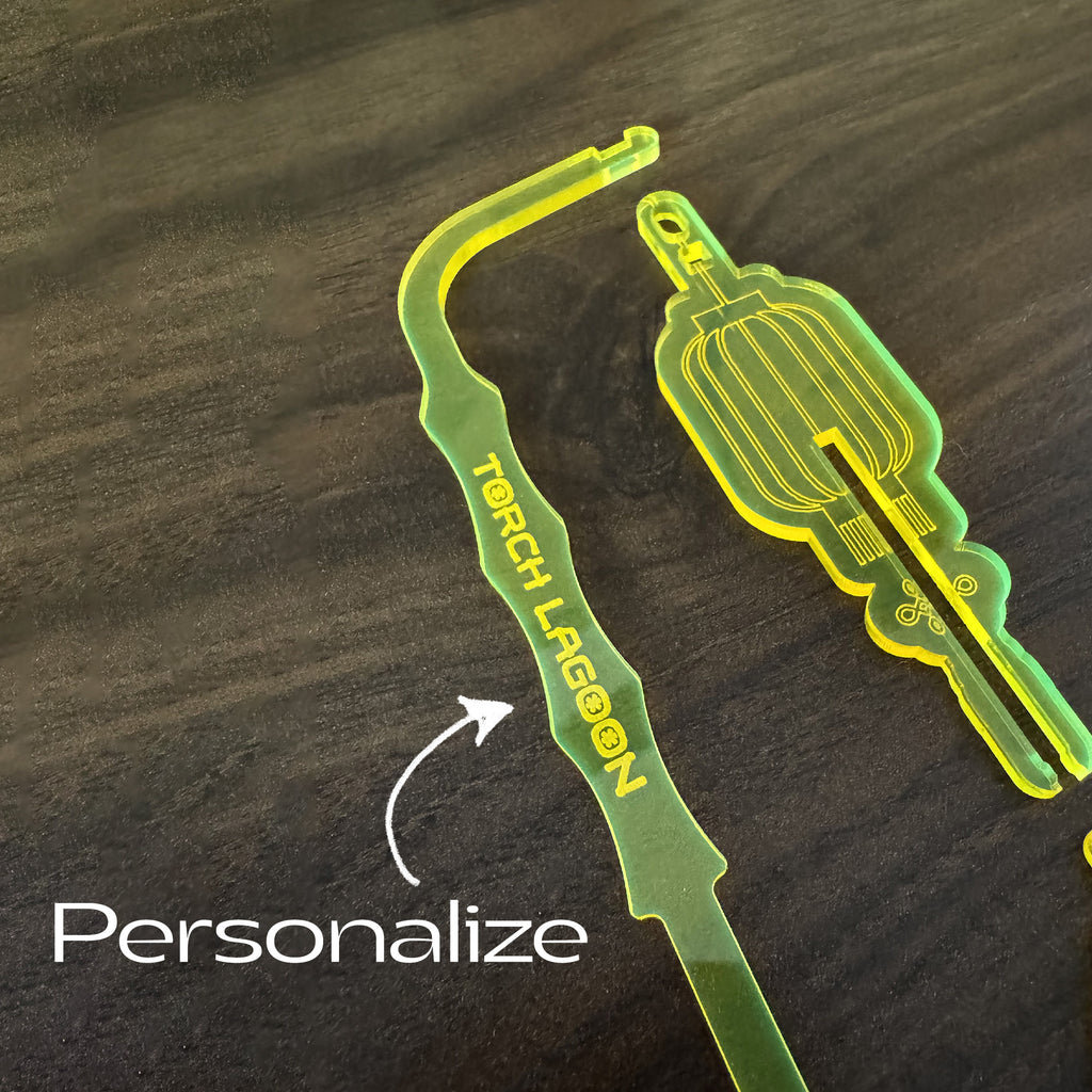 Chinese Lantern "Torch Lagoon" Personalized Swizzle Stick on a dark surface