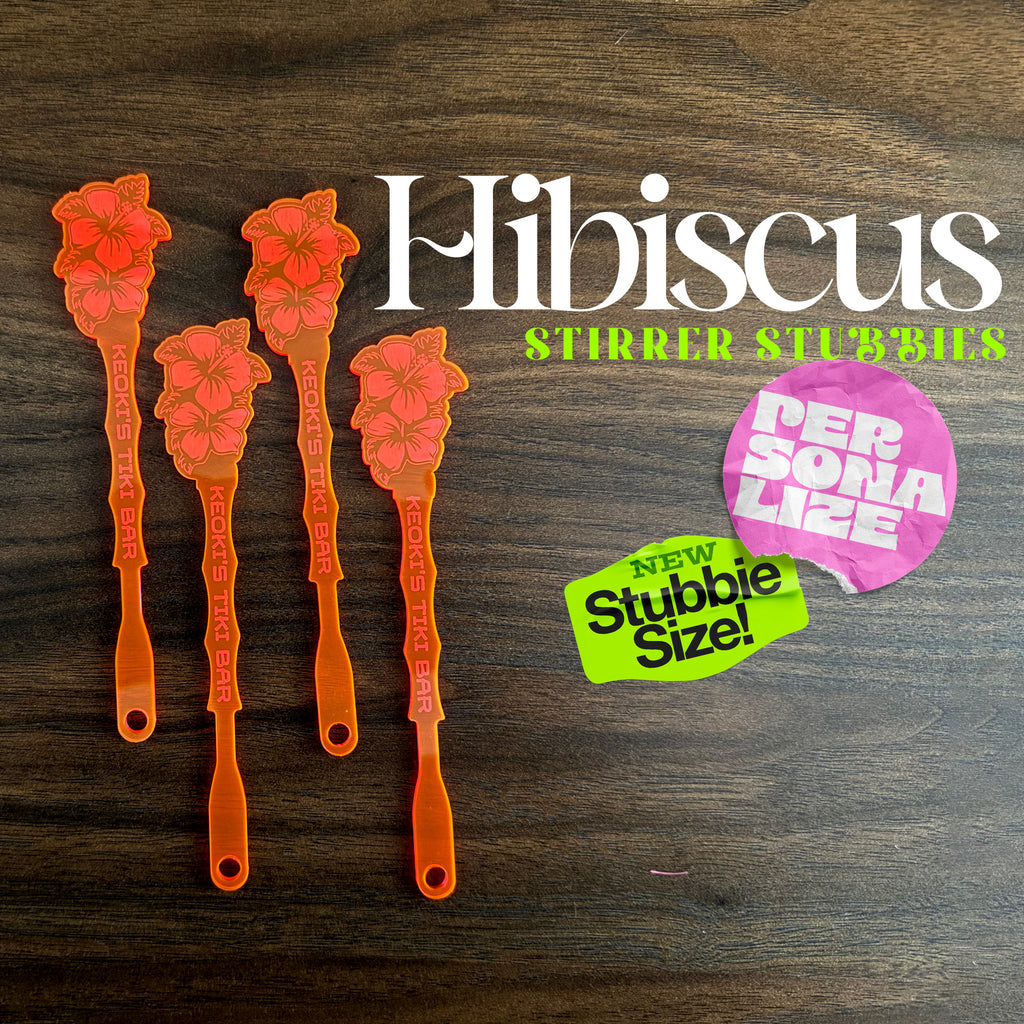 Hibiscus Flower Personalized Stubbie Drink Stirrer with 'Hibiscus' branding on a wooden surface