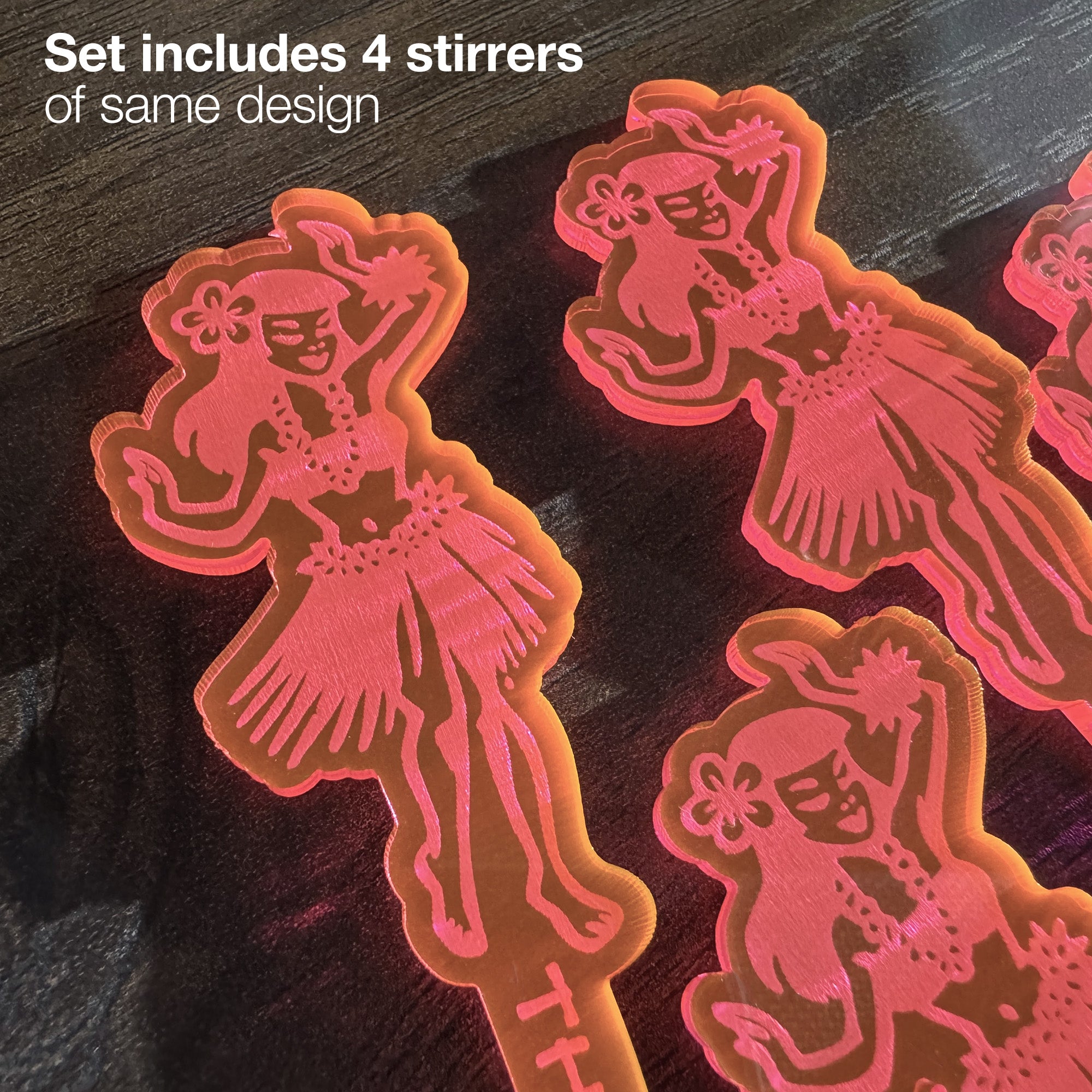 Set of four Hula Dancer "Loco Luau" Personalized Stubbie Swizzle Sticks with dancer design on a dark surface.