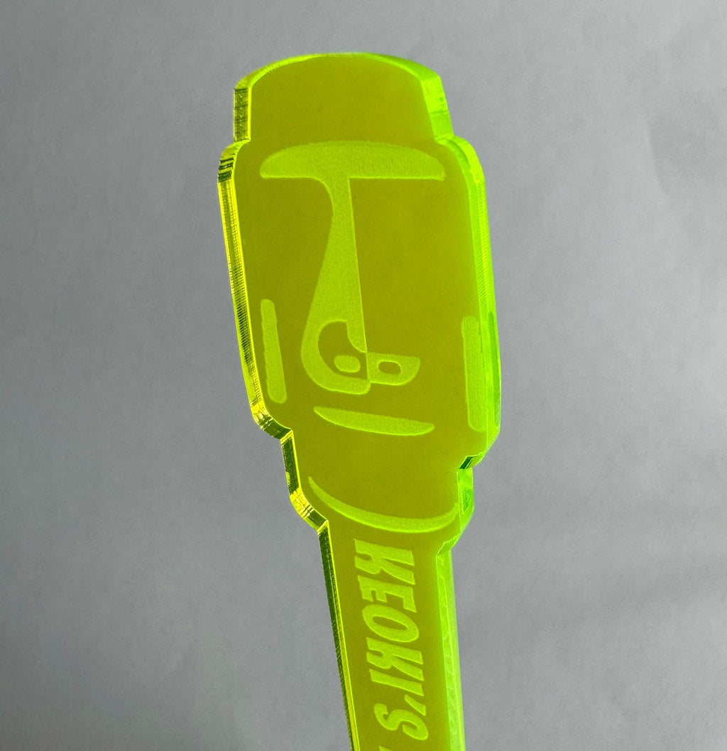 Moai Statue Personalized Swizzle Stick on a gray background
