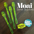 Moai Statue Stubbie Drink Stirrers on a dark wood background, with large white text reading 'Moai Stirrer Stubbies' and two colorful promotional stickers.