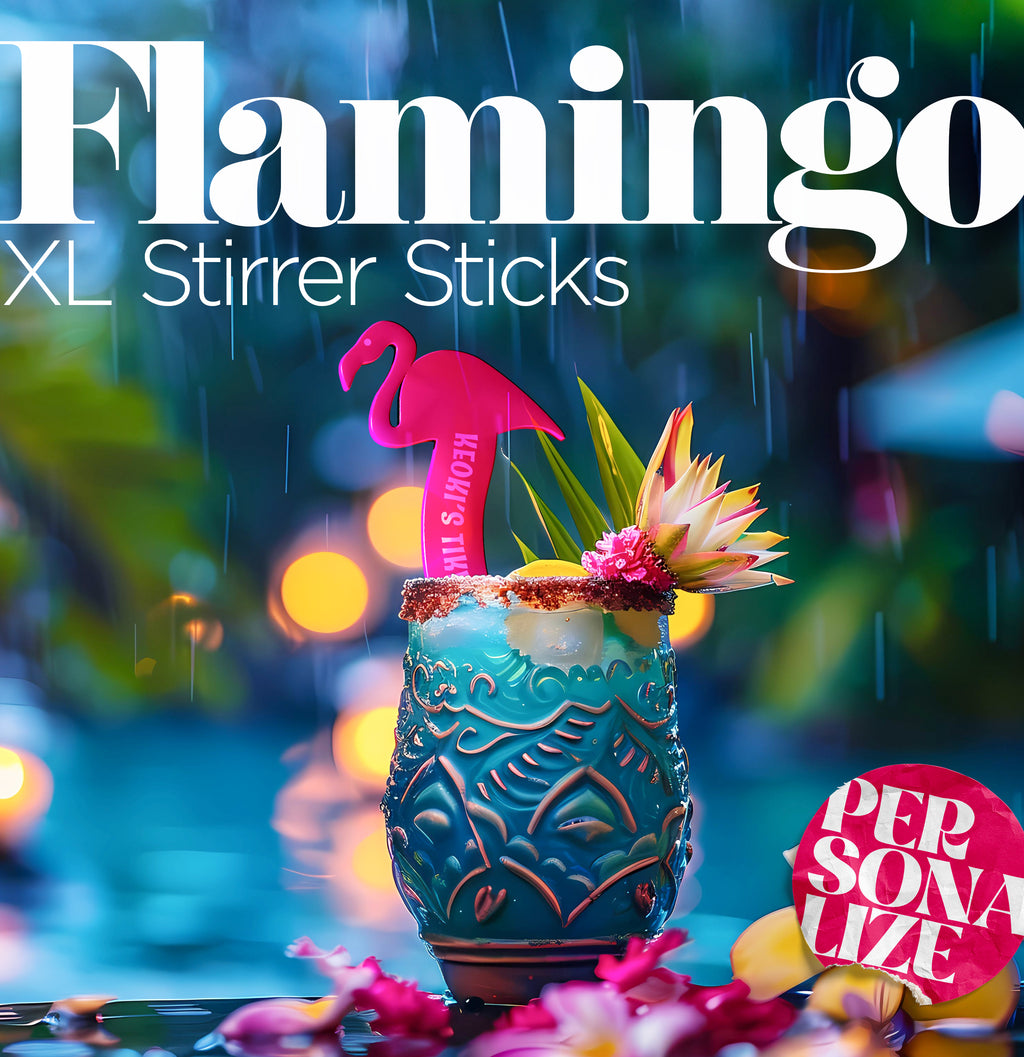 Flamingo Personalized Drink Stirrer. A cocktail with pink flamingo personalized drink stirrer stick against a colorful blurred background