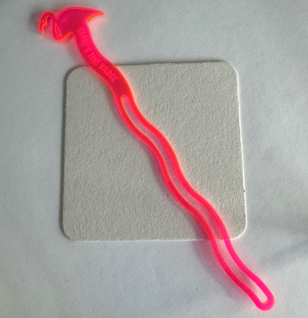 Pink Flamingo Personalized Drink Stirrer on a gray background