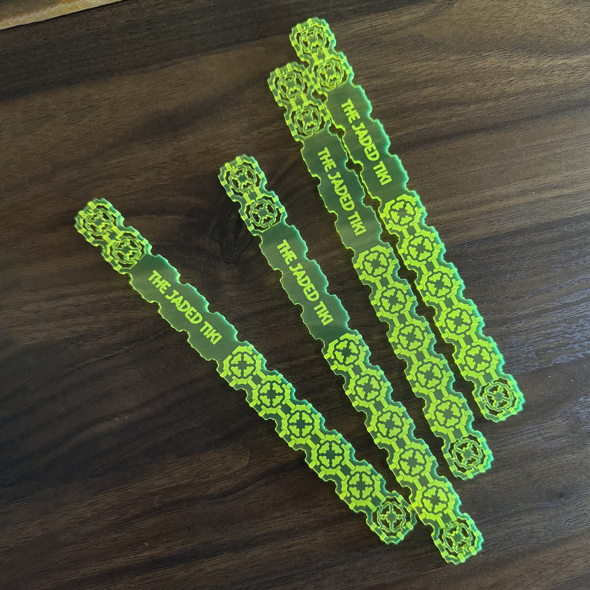 The Jaded Tiki_Jade Tile Personalized XL Drink Stirrers on a wooden surface