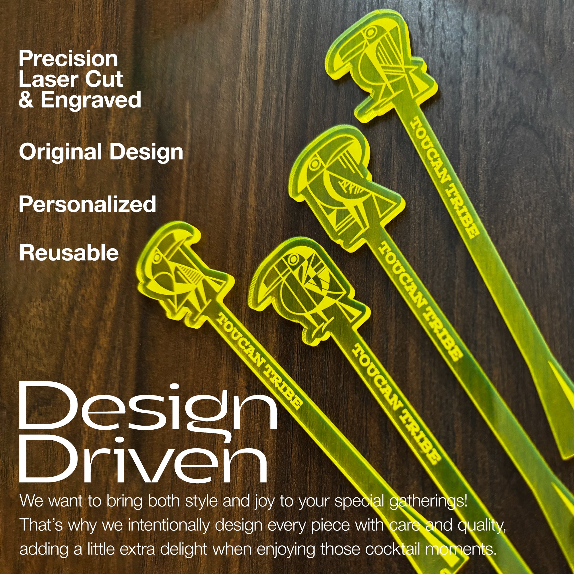 Four neon yellow-green acrylic cocktail drink stirrer sticks with Toucan logo art designs, displayed on a dark wood background with a green lower banner containing marketing text.
